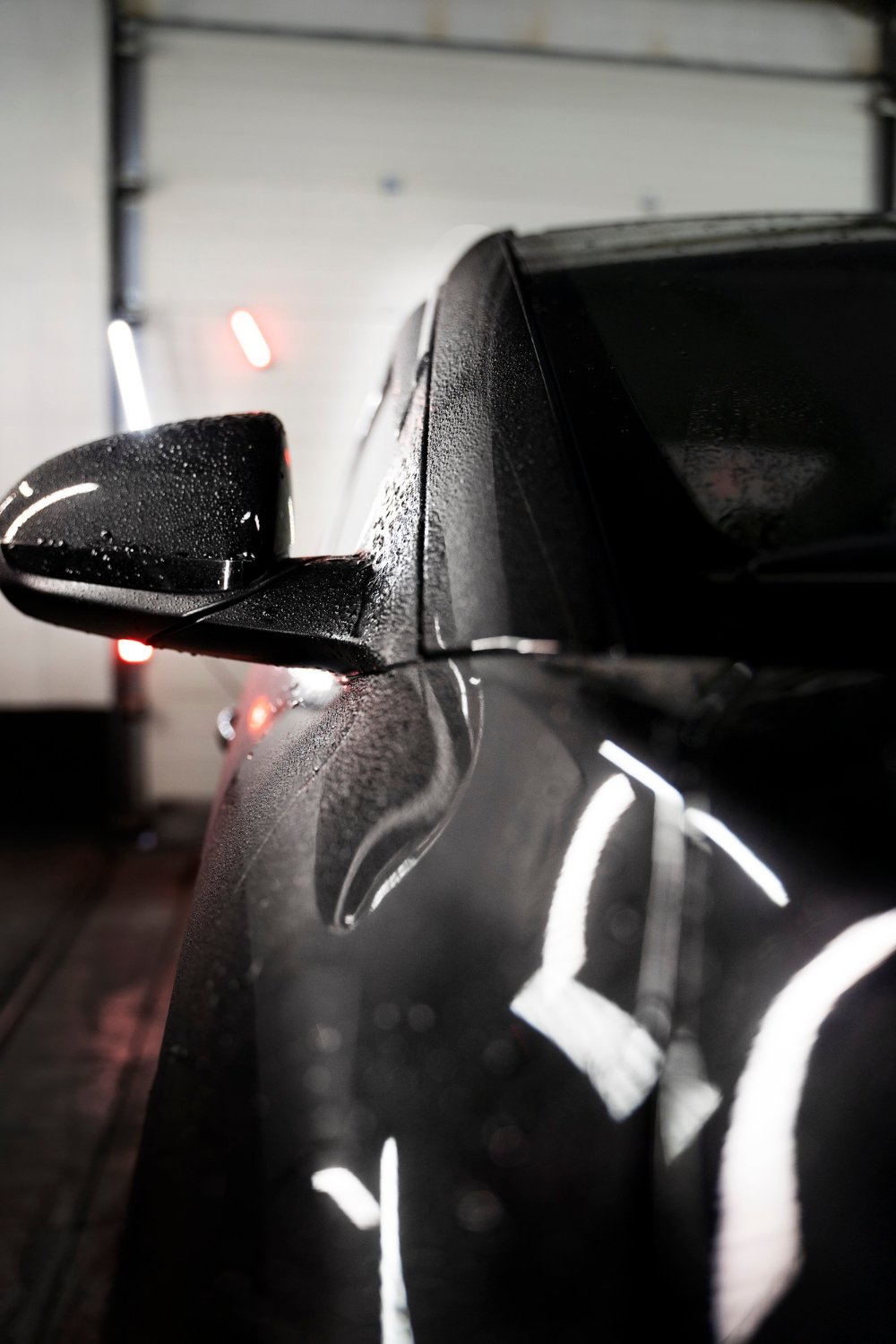 Crystal-clear Paint Protection Film on the bonnet of a red sports car